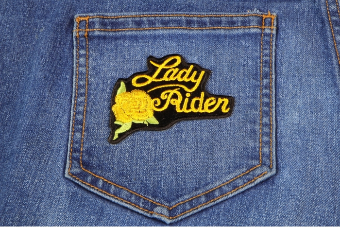 Yellow Lady Rider Rose Biker Patch shown on jeans
