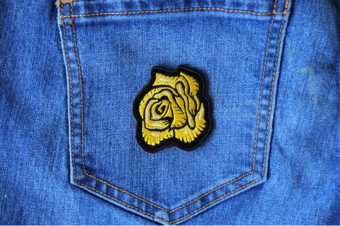 Yellow Rose Patch shown on jeans