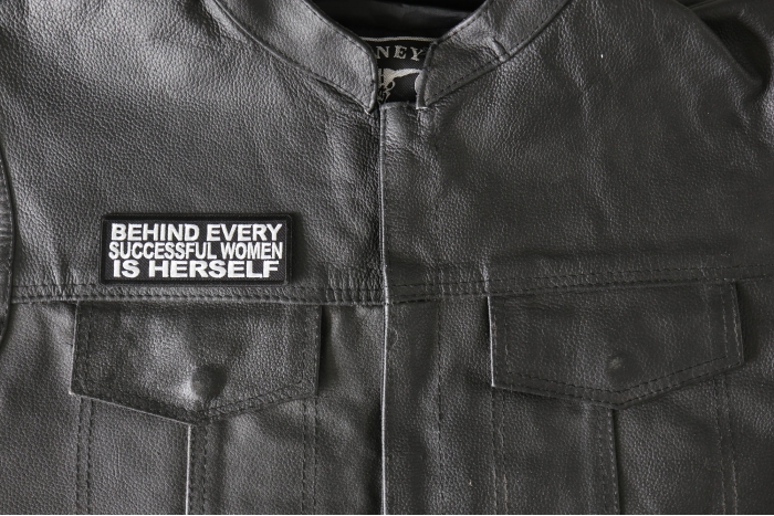 Behind Every Successful Women is Herself Patch - 4x1.5 inch - Embroidered Iron on Patch shown on leather vest