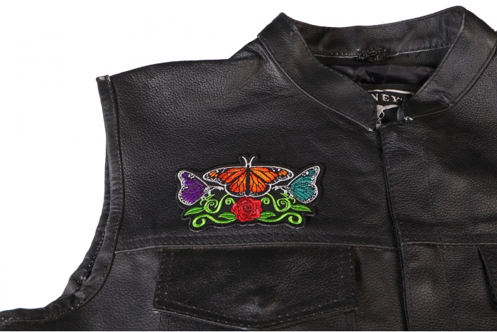 Butterflies and Flower Ladies Patch - 4.5x2.8 inch. Embroidered Iron on Patch shown on leather vest