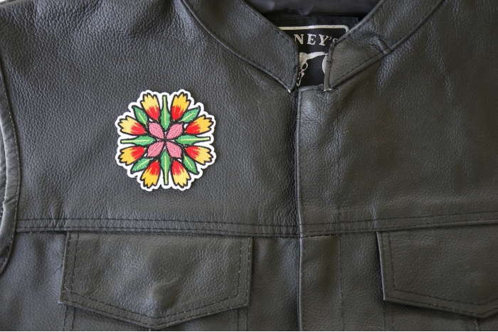 Flower Petals and Leaves Mix Patch - 3x3 inch. Embroidered Iron on Patch shown on leather vest