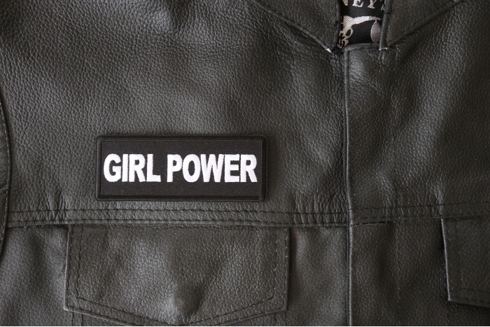 Girl Power Patch - 4x1.5 inch - Embroidered Iron on Patch shown on leather vest