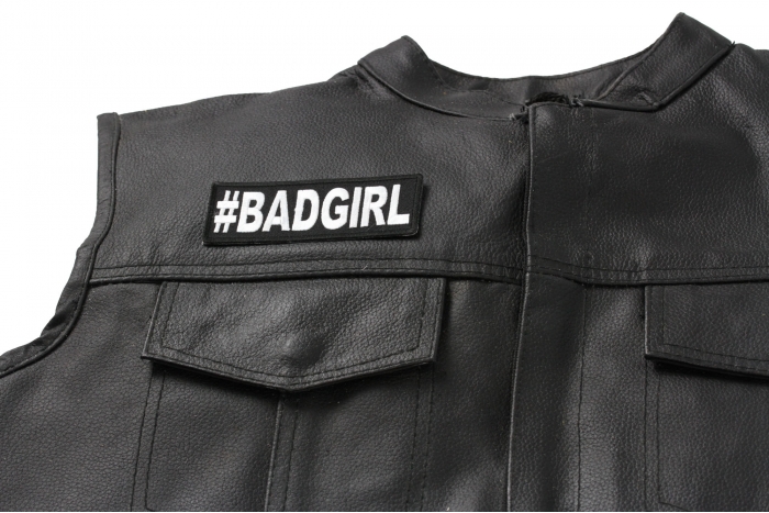 Hashtag Bad Girl Patch - 4x1.5 inch. Embroidered Iron on Patch shown on leather vest