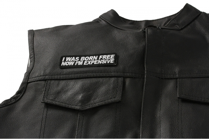 I Was Born Free Now I'm Expensive Patch - 4x1 inch. Embroidered Iron on Patch shown on leather vest