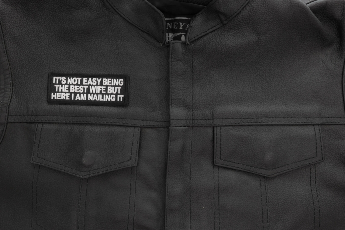 It's not easy being the best wife but here I am nailing it patch shown on leather vest