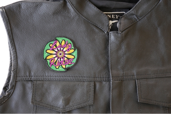 Lady Rider Flowers Patch - 3x3 inch. Embroidered Iron on Patch shown on leather vest