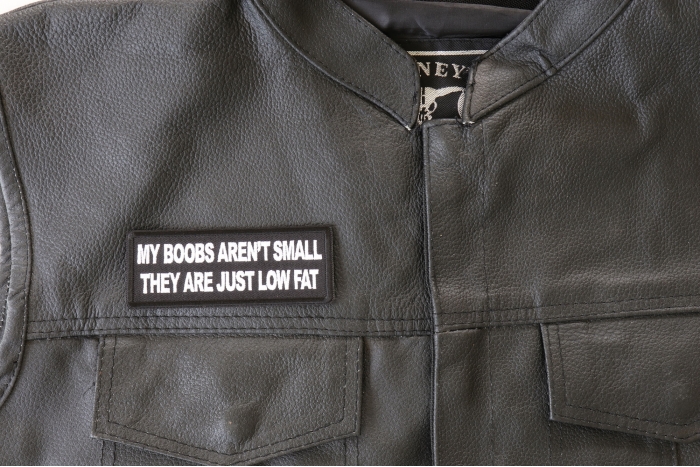 My Boobs Aren't Small They Are Just Low Fat Patch, Funny Saying Patches shown on leather vest