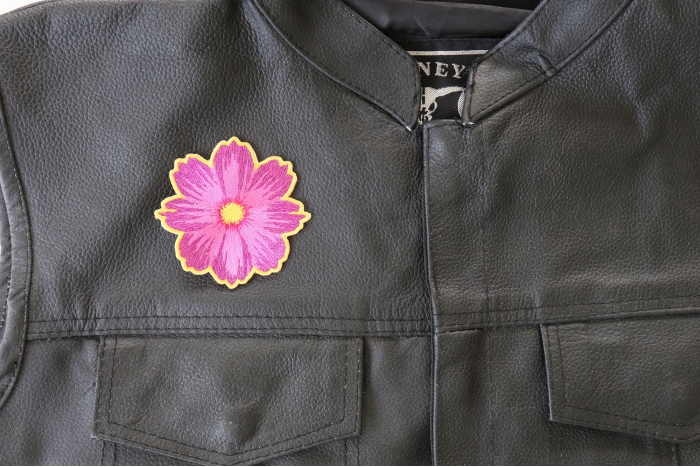 Pink Flower Patch - 3x3 inch. Embroidered Iron on Patch shown on leather vest