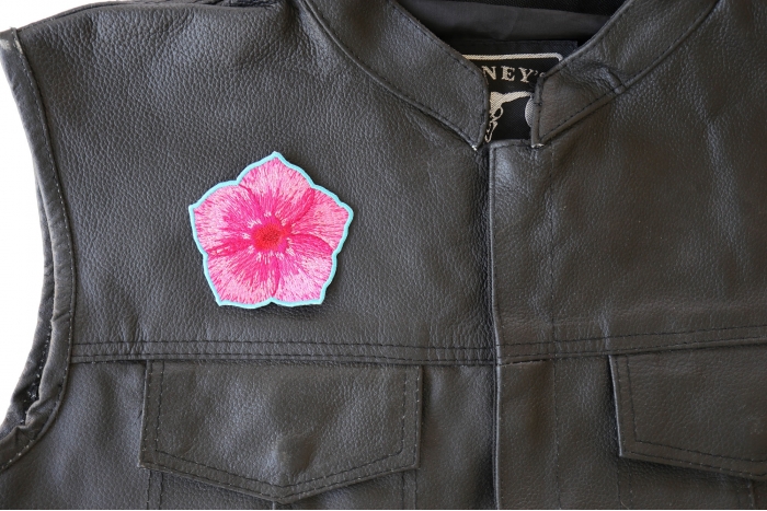 Pink Flower Petal Patch - 3x3 inch. Embroidered Iron on Patch shown on leather vest