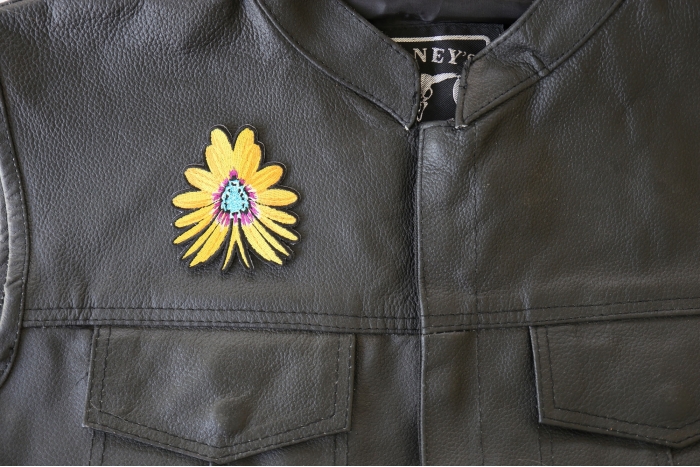 Yellow Flower Butterfly Patch - 2.6x3 inch. Embroidered Iron on Patch shown on leather vest