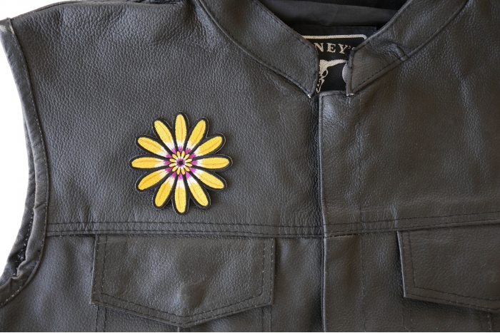 Yellow Flower Patch - 3x3 inch. Embroidered Iron on Patch shown on leather vest