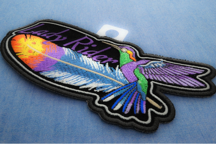 Hummingbird Lady Rider Feather Small Iron on Biker Patch diagonal view