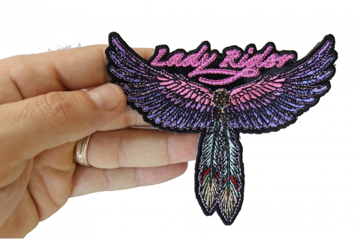 Lady Rider Wings and Feather Small Patch shown on hand for size comparison