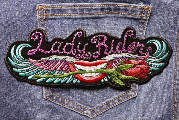 Lady Rider Patch with Crystals Rose and Wings shown on jeans