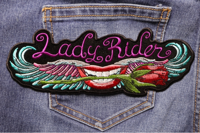 Lips and Roses Lady Rider Large Iron on Patch shown on jeans