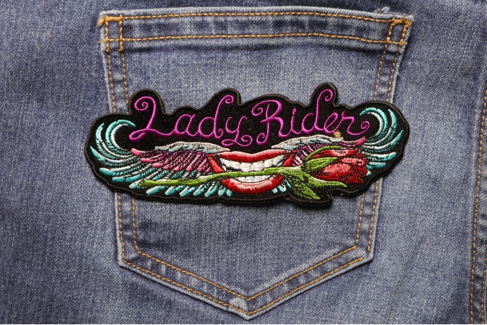 Lady Rider Patch Biting Rose shown on jeans