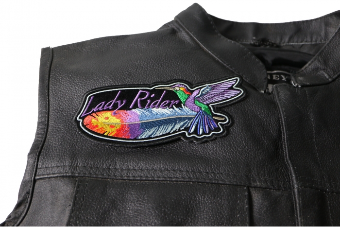 Hummingbird Lady Rider Feather Small Patch - 6x2.6 inch. Embroidered Iron on Patch shown on leather vest