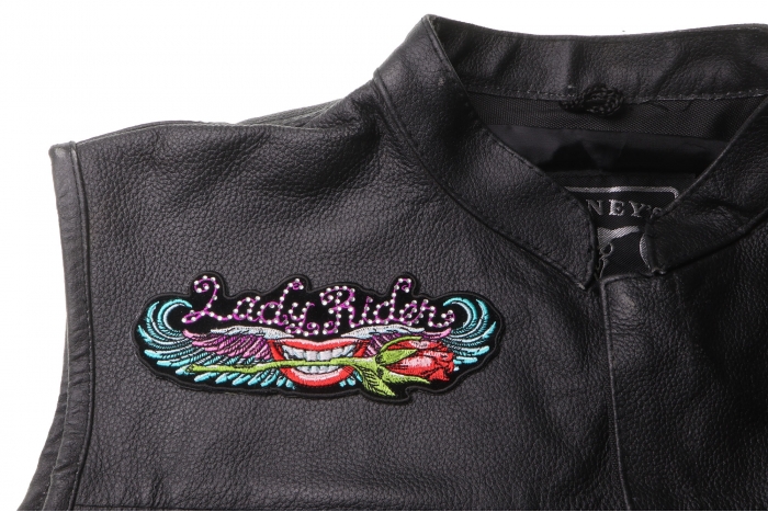 Lips and Roses Lady Rider Patch with Crystals - 5.75x2.2 inch. Embroidered Iron on Patch shown on leather vest