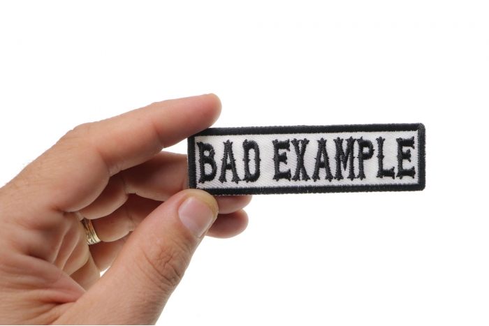 Bad Example Patch, Motorcycle Club Patches for Bikers shown on hand for size comparison