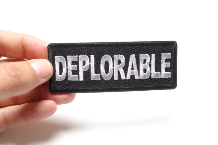 Deplorable Patch shown on hand for size comparison