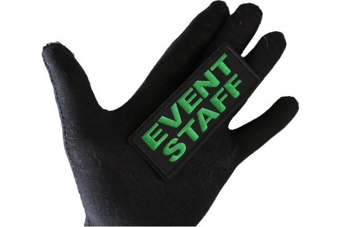 Event Staff Patch Green shown on hand for size comparison