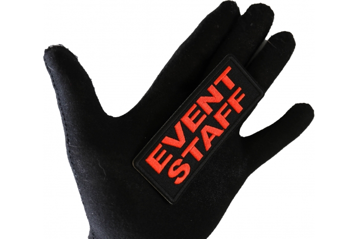 Event Staff Patch Orange shown on hand for size comparison