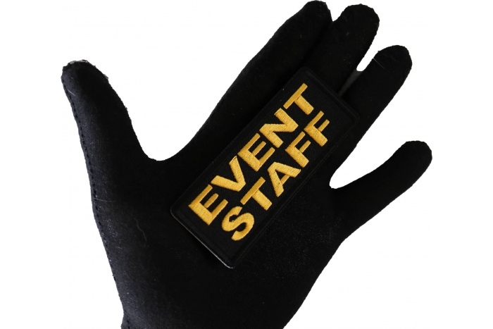 Event Staff Patch Yellow shown on hand for size comparison