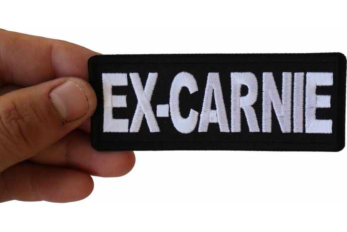 Ex Carnie Patch shown on hand for size comparison
