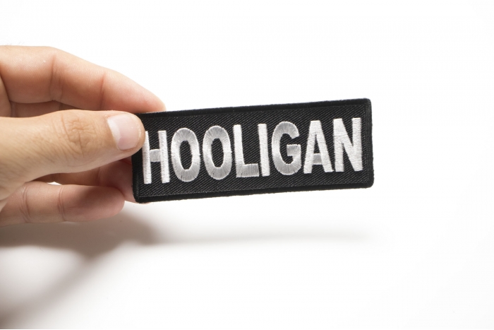 Holligan Patch shown on hand for size comparison