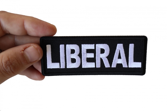 Liberal Patch shown on hand for size comparison