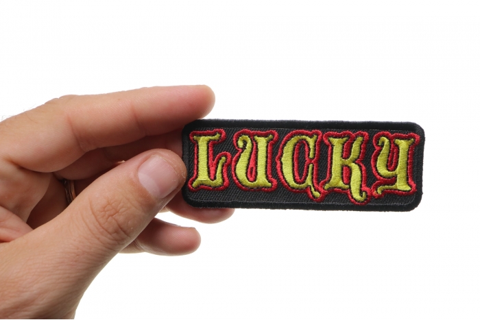 Lucky Patch, Funny Patches for Ladies shown on hand for size comparison