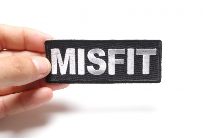 Misfit Patch shown on hand for size comparison