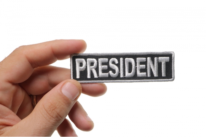 President Patch, Motorcycle Club Patches for Bikers shown on hand for size comparison
