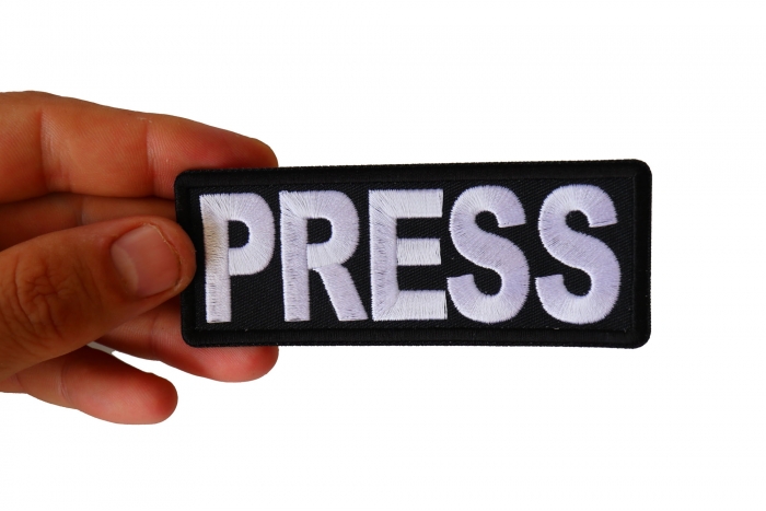 Press Patch shown on hand for size comparison