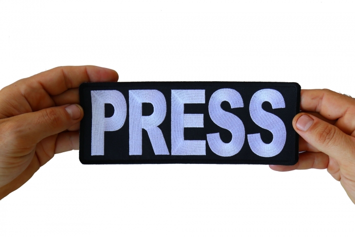 Press Patch, Large Back Patches for Vests shown on hand for size comparison