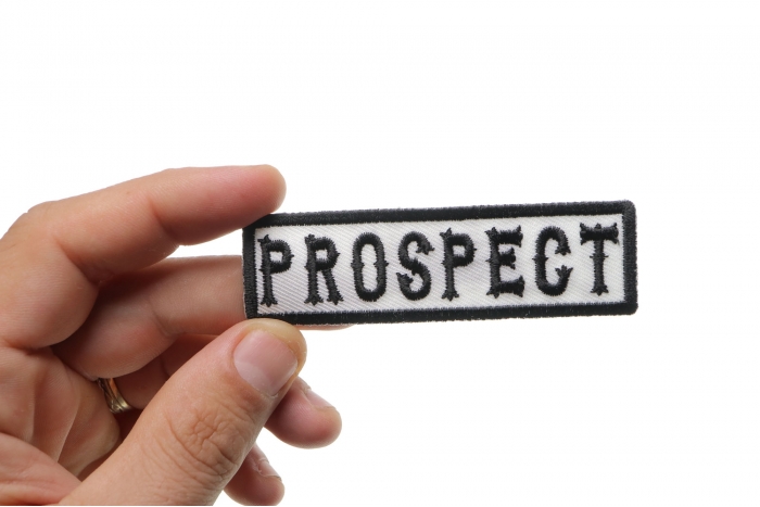  shown on hand for size comparison