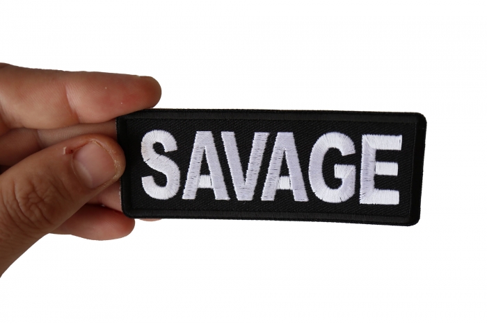 Savage Patch shown on hand for size comparison