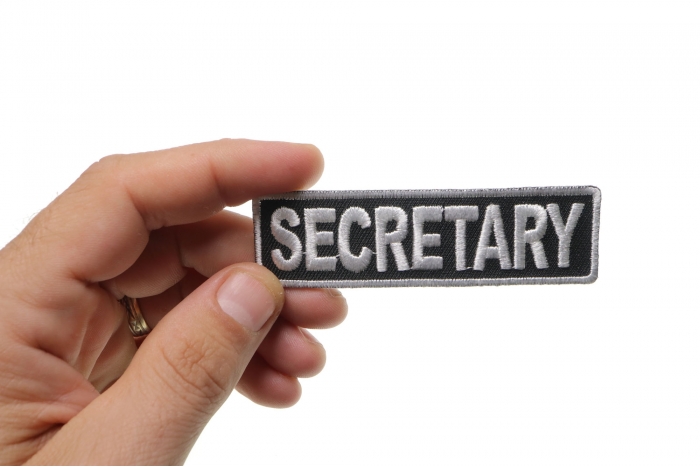 Secretary Patch, Motorcycle Club Patches for Bikers shown on hand for size comparison