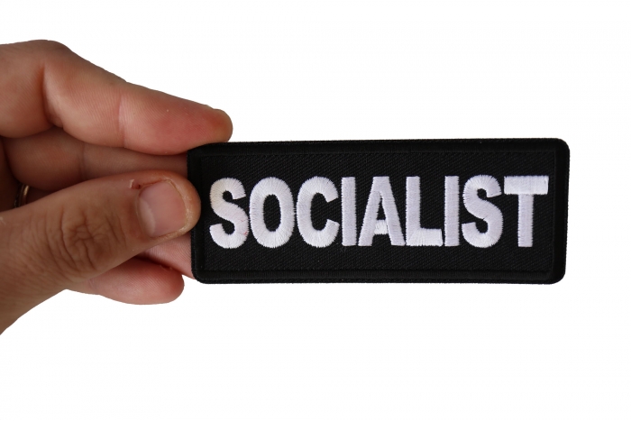 Socialist Patch shown on hand for size comparison