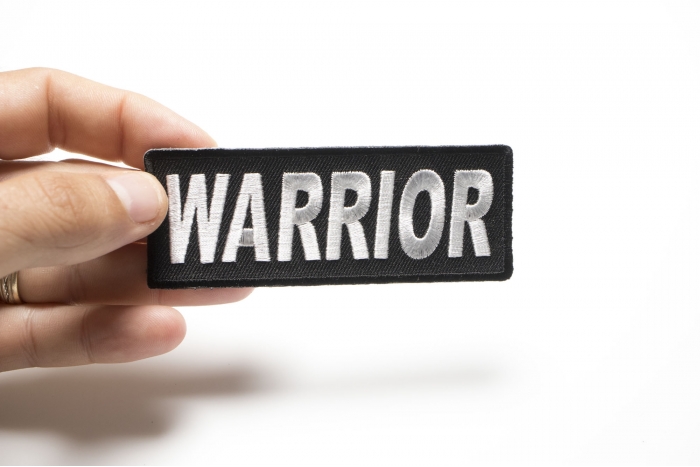 Warrior Patch shown on hand for size comparison