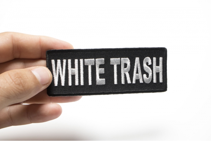 White Trash Patch shown on hand for size comparison