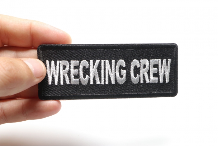 Wrecking Crew Patch shown on hand for size comparison