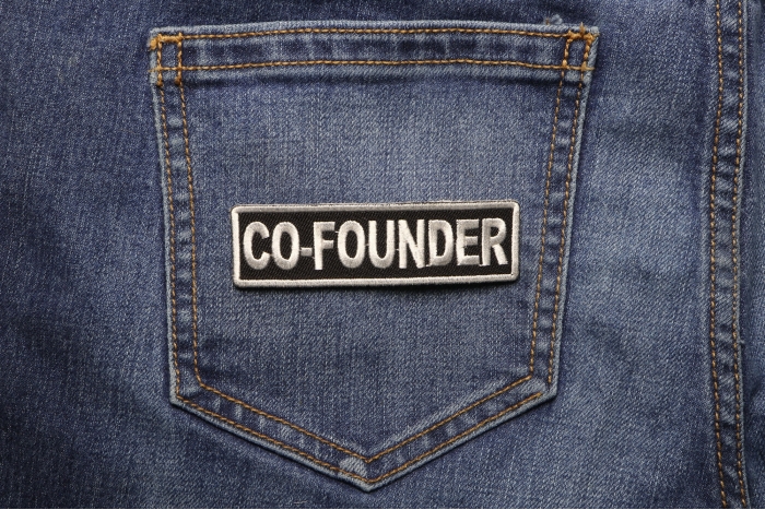 Cofounder Patch shown on jeans