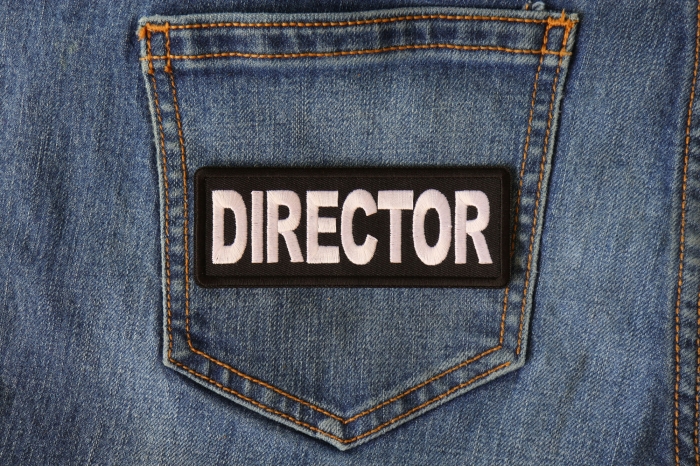 Director Patch shown on jeans
