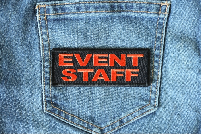Event Staff Patch Orange shown on jeans