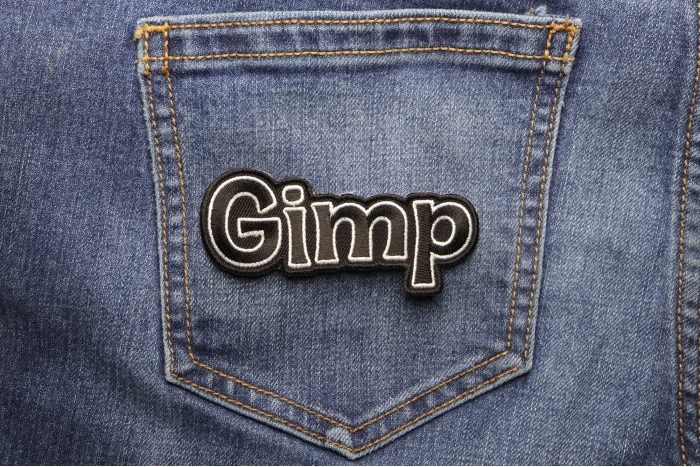 Gimp Funny Iron on Patch shown on jeans