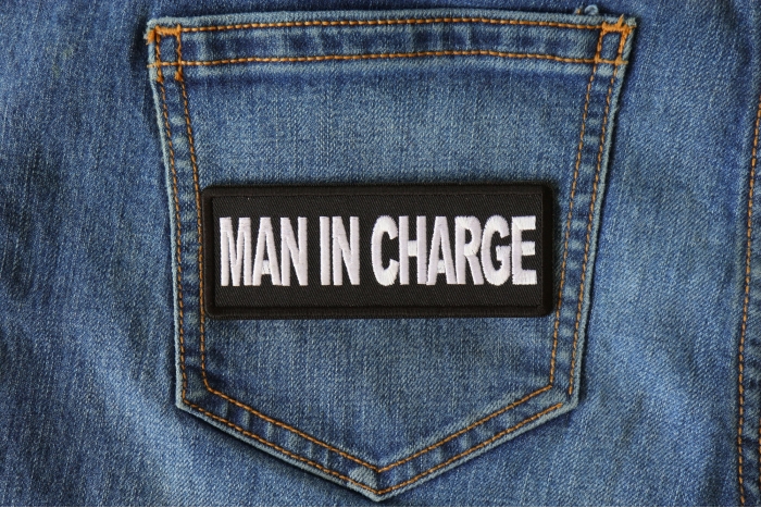 Man in Charge Funny Iron on Patch shown on jeans