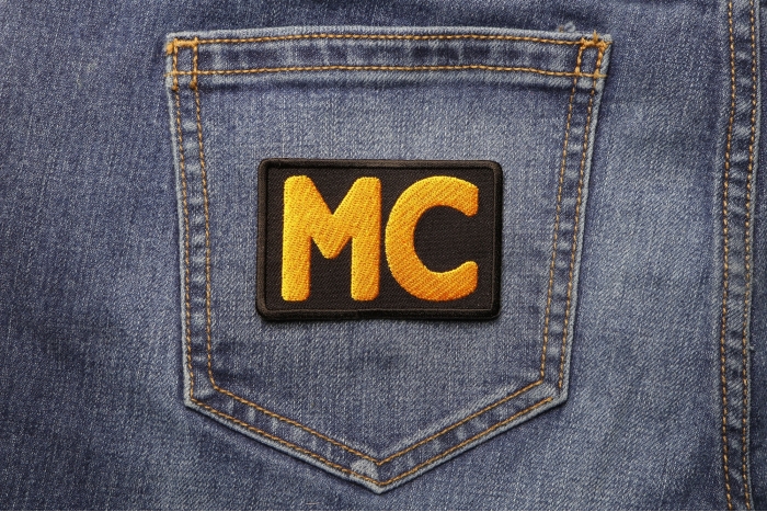 Yellow MC Patch shown on jeans