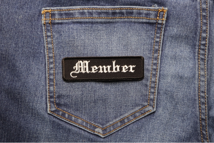 Member Patch In Old English shown on jeans
