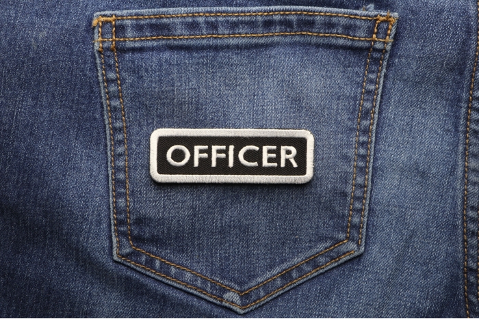 Officer Name Tag Patch shown on jeans